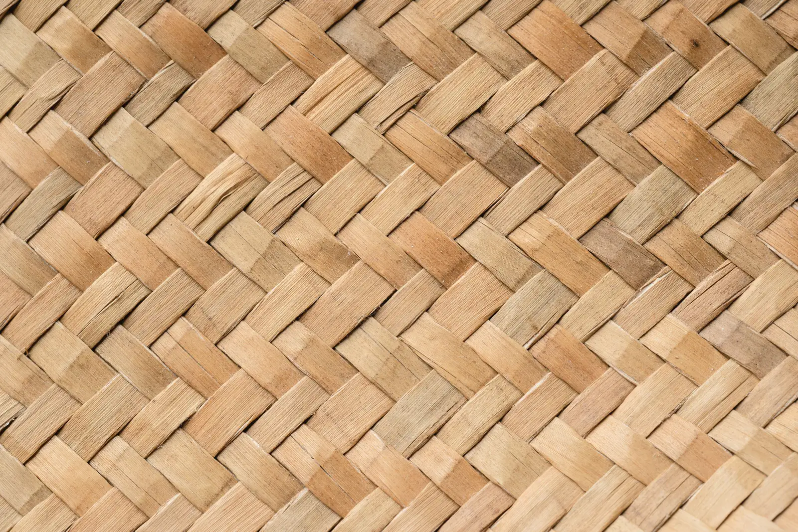 Close-up of a hand-woven mat pattern.